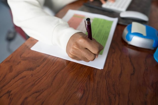 A focused individual filling out an official government form, specifically related to applying for disability benefits, with a pen in hand and supportive documents neatly arranged on the table.
