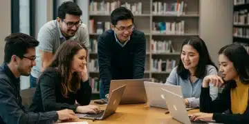 Diverse graduate students researching funding options in a university library.
